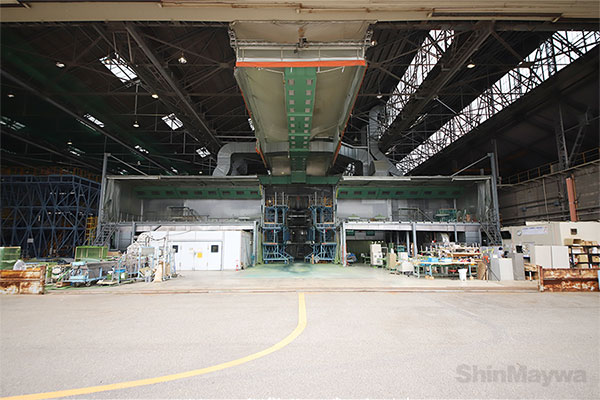 This is a panoramic view of a huge painting booth that can hold a whole US-2.