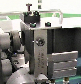 Photo of independent cutter unit with cutting blade and stripping blade
